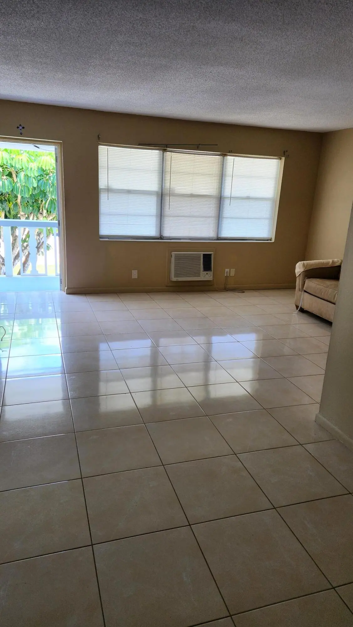 Living Room from Dining Area at 102 Andover D, West Palm Beach