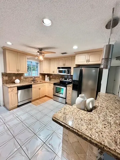 1080B960-BF19-4CFD-84A3-0A6D4361201E at 10079 Yeoman Lane, Royal Palm Beach