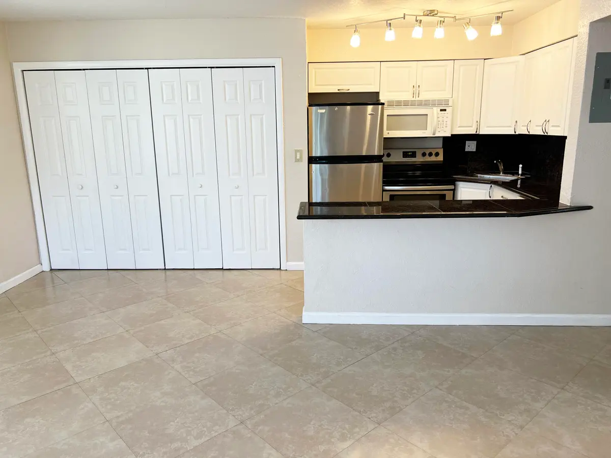 Kitchen and Storage at 4050 NE 12th Terrace 15-1, Oakland Park