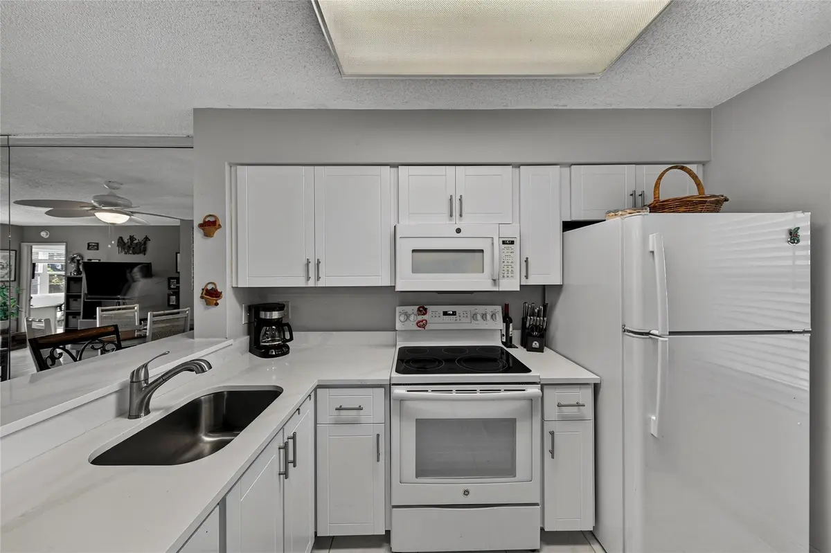 Kitchen Updated 2025 at 2222 N CYPRESS BEND Drive 201, Pompano Beach