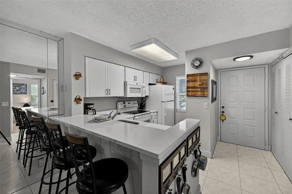 Photo 5 at 2222 N CYPRESS BEND Drive 201, Pompano Beach