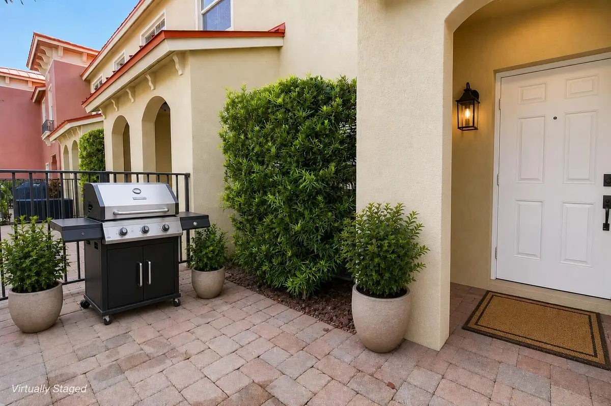 Covered Front Patio Retreat at 340 Lake Monterey Circle, Boynton Beach