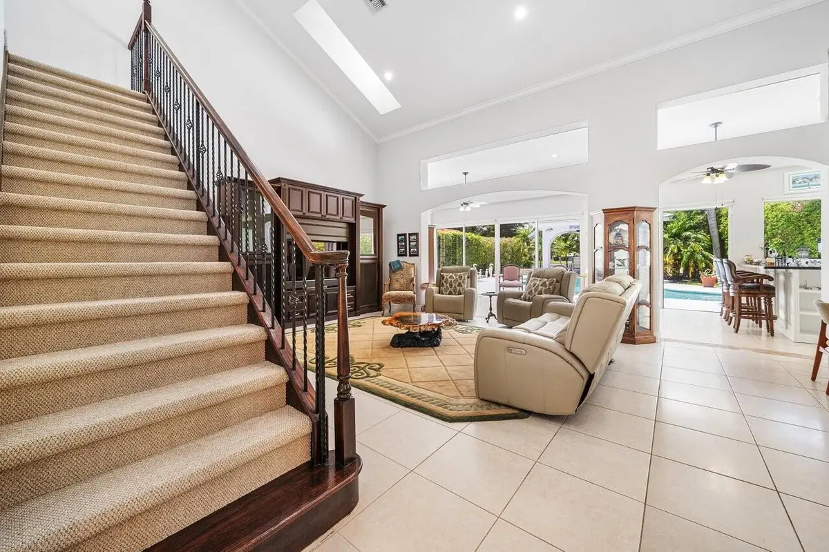 Stairs and Family Room at 6990 Cypress Cove Circle, Jupiter