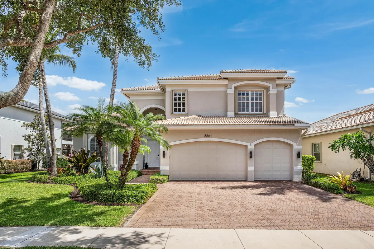 Lushly Landscaped Exterior at 8861 Starhaven Cove, Boynton Beach
