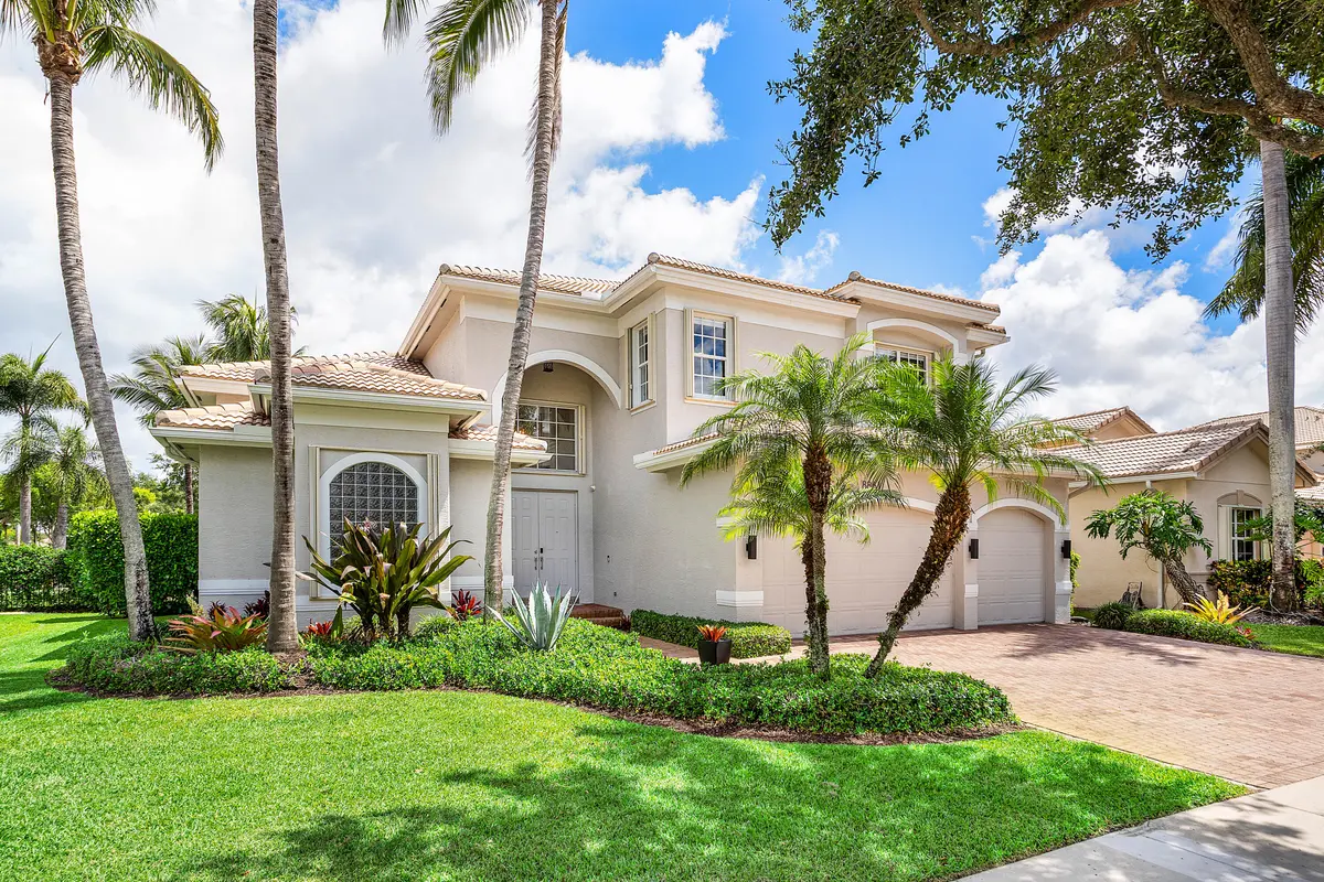 Lushly Landscaped Exterior at 8861 Starhaven Cove, Boynton Beach