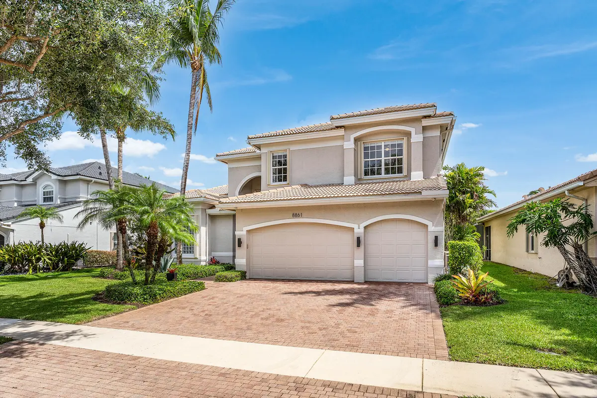 Lushly Landscaped Exterior at 8861 Starhaven Cove, Boynton Beach
