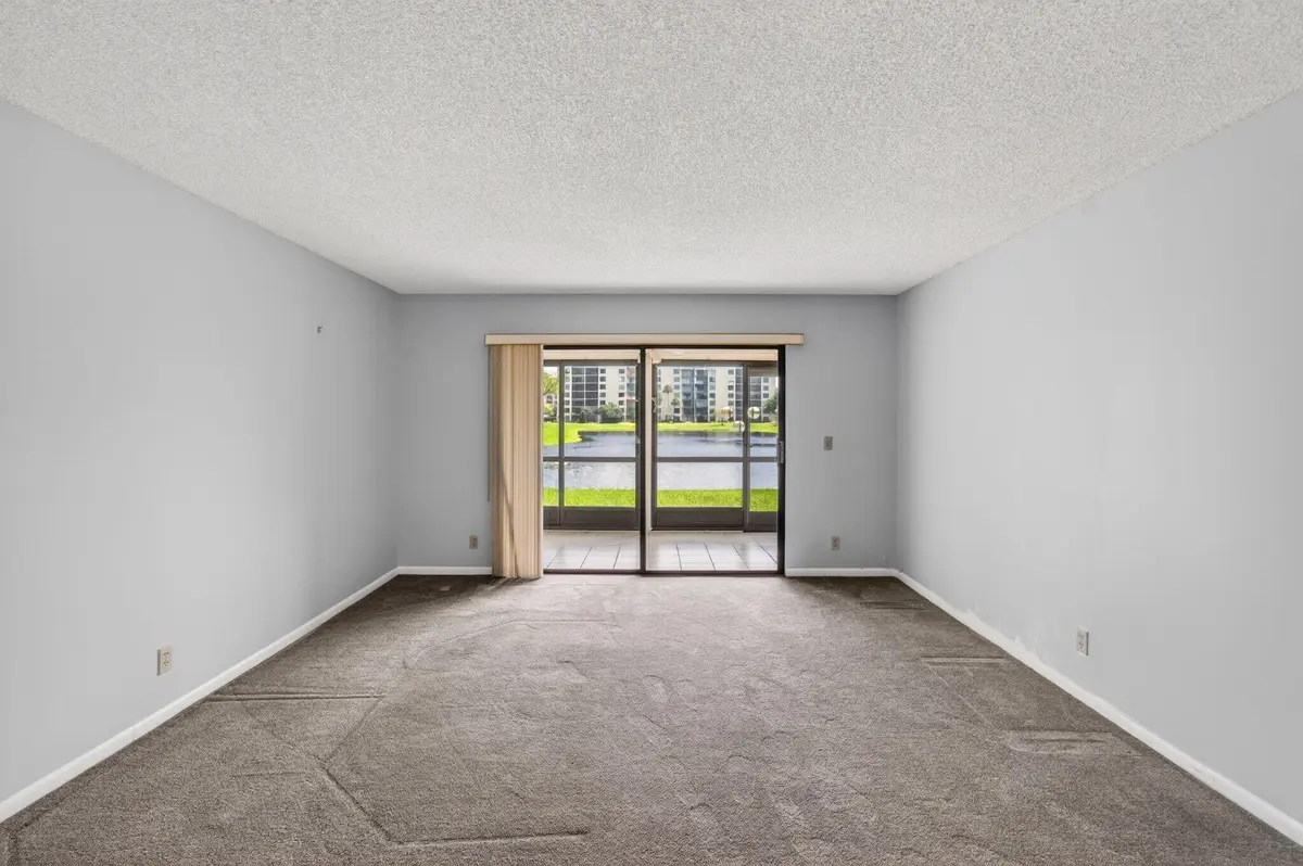 Living Area Lake views at 6655 Kensington Lane, Delray Beach