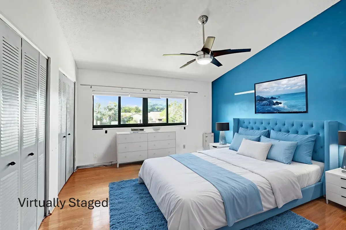 Virtual Staging 2 prime bedroom wm at 3080 S Oakland Forest Drive 101, Oakland Park