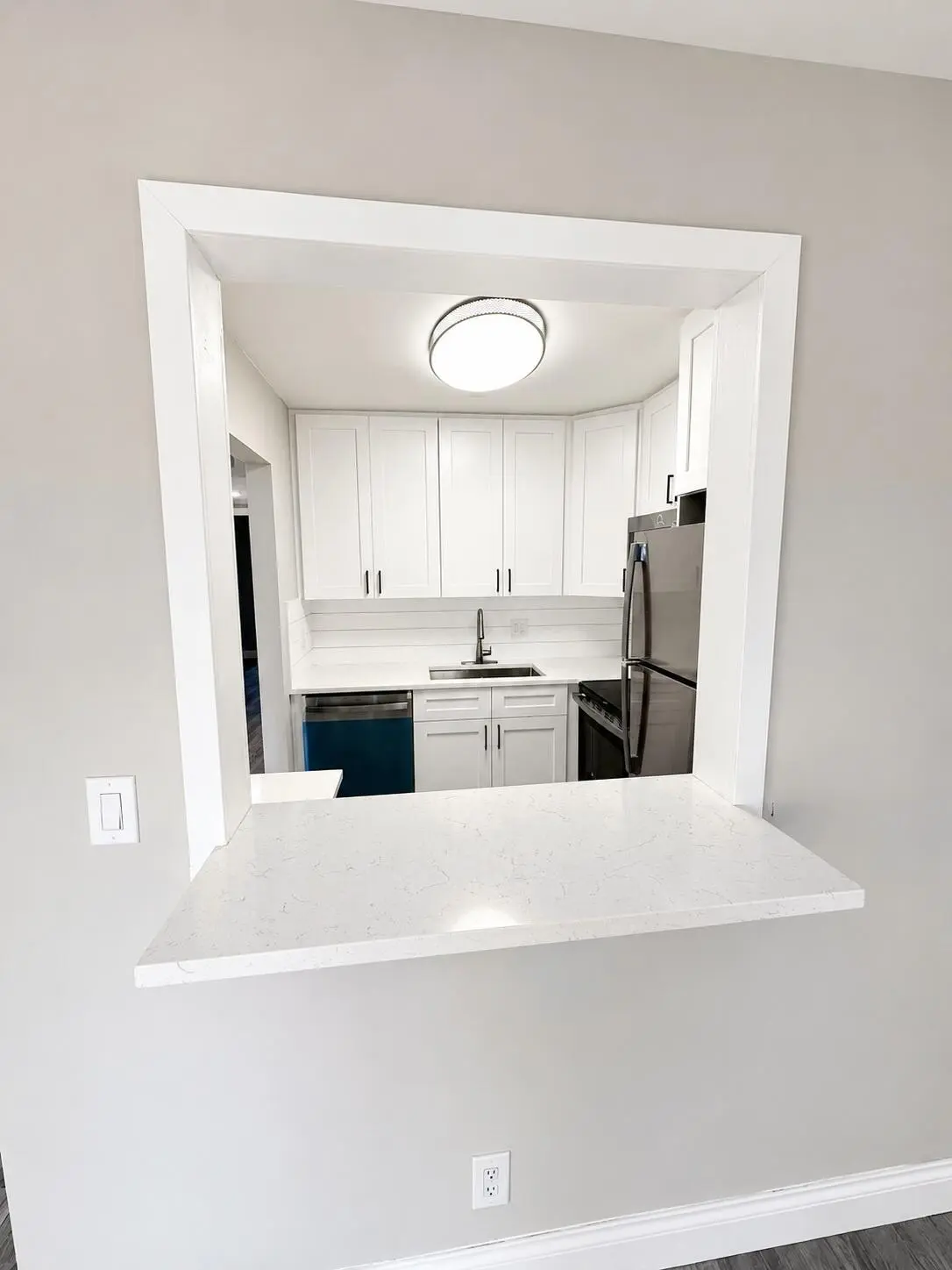05_KitchenPassthrough2 at 115 S South Boulevard 2c, Boynton Beach
