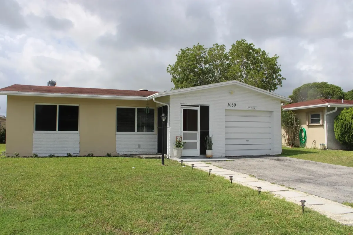 Front from left at 1030 NW 49th Court, Deerfield Beach