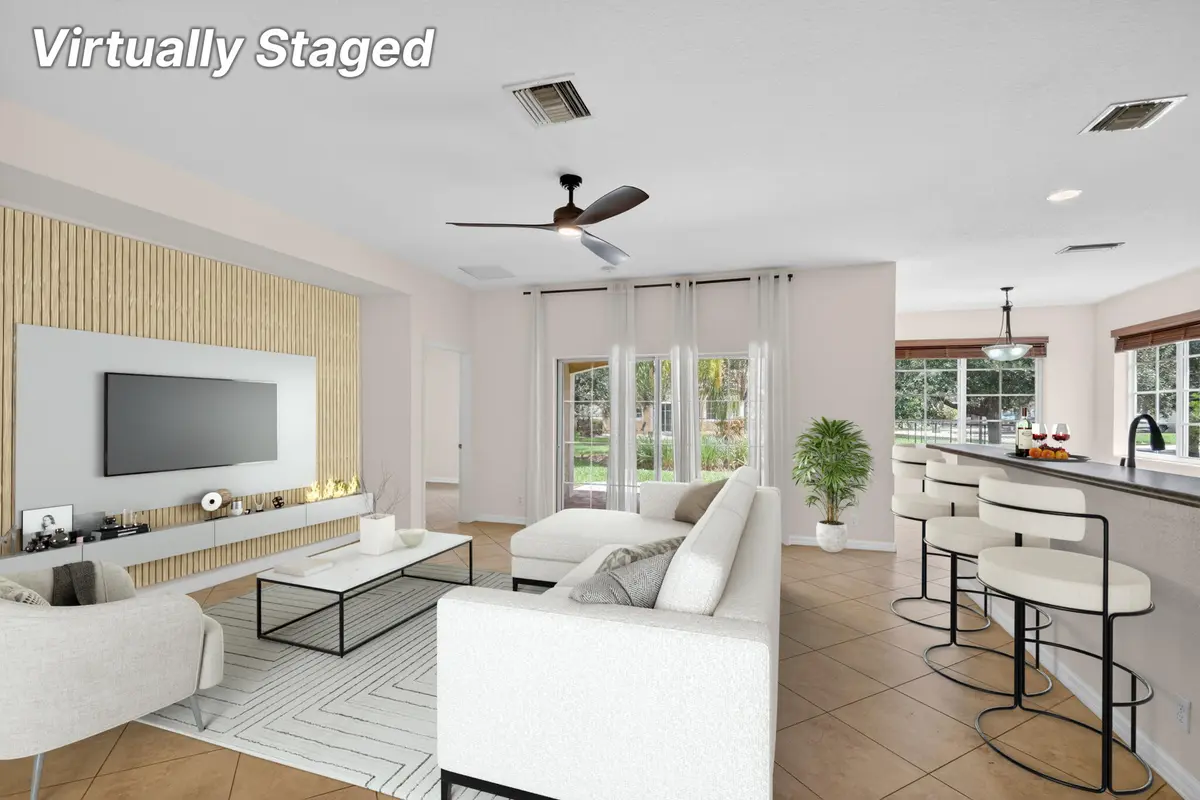 Living Room Virtually Stage at 6810 Osage Circle, Greenacres