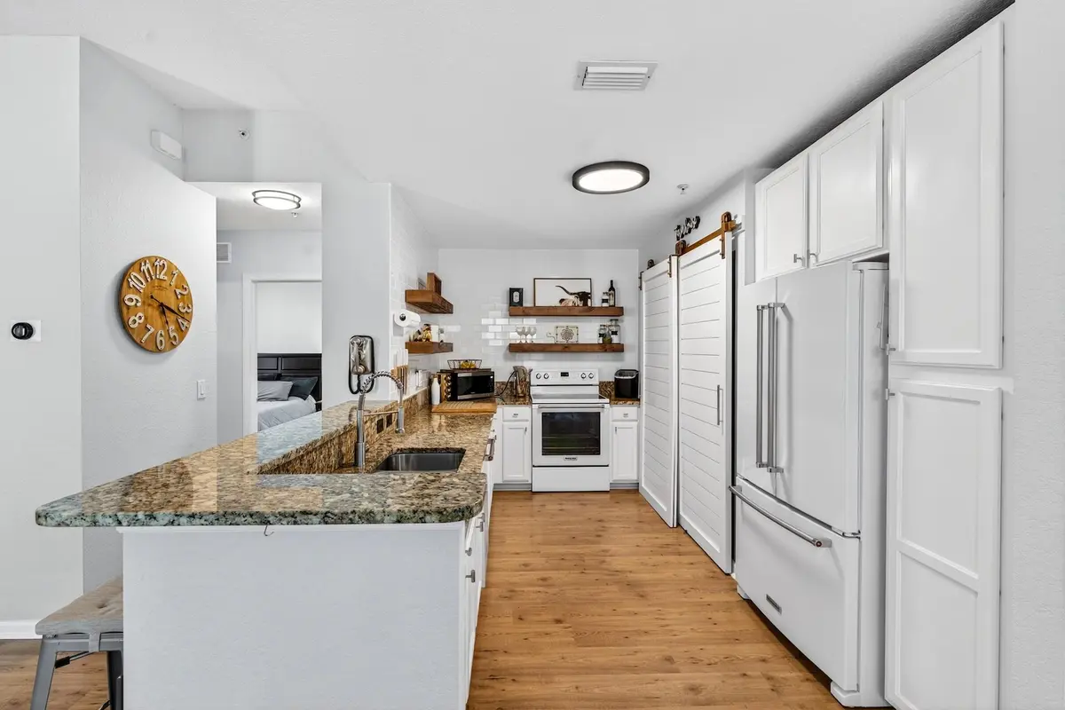 KITCHEN, GRANITE COUNTERTOPS at 4680 Mimosa Place 805, Coconut Creek