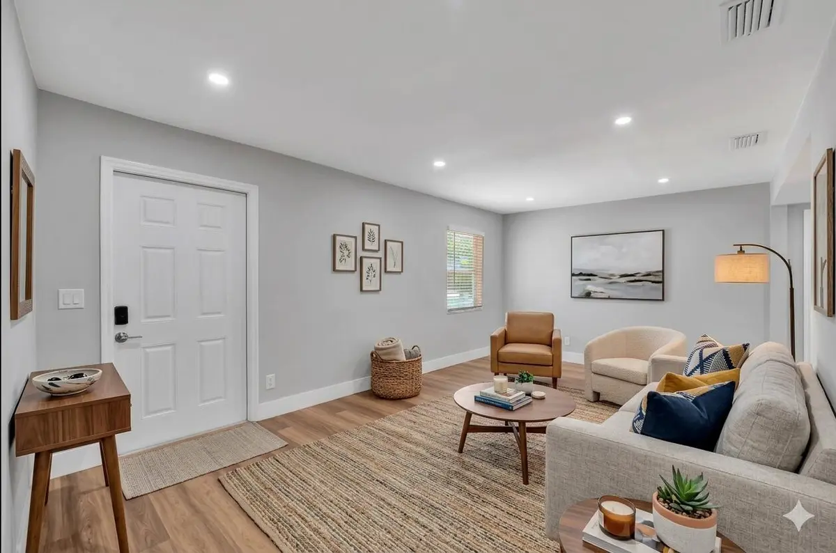 Living room virtually staged at 125 E Hart Street, Lantana