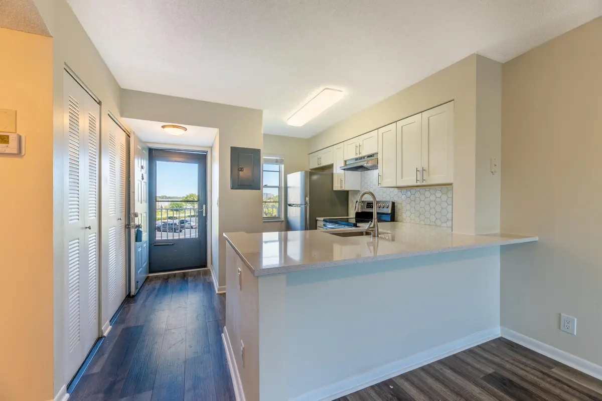 Looking into Kitchen from Dining Area at 2226 N Cypress Bend Drive 308, Pompano Beach