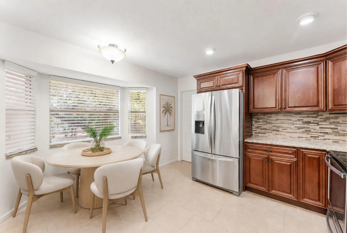 Staged Dining & Kitchen Area at 112 Laurel Way, Royal Palm Beach