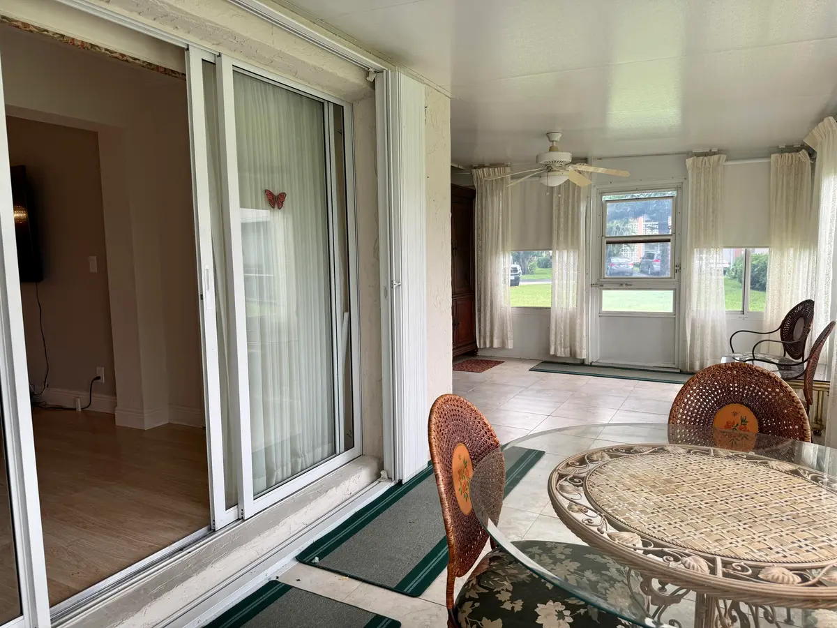 ENCLOSED PORCH at 1460 NW 19th Terrace 71-a, Delray Beach