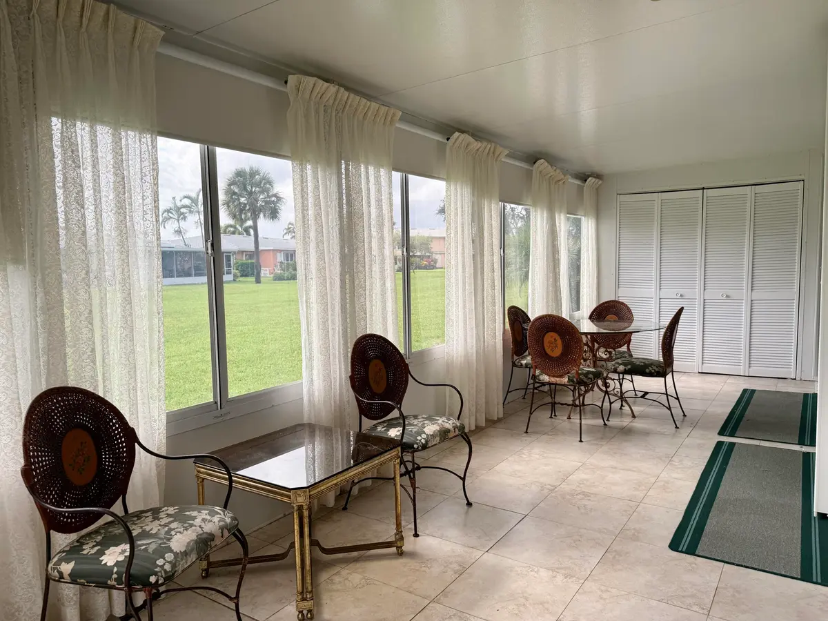 ENCLOSED PORCH at 1460 NW 19th Terrace 71-a, Delray Beach