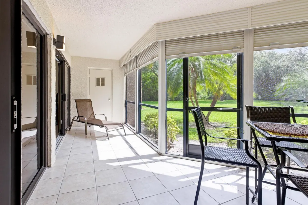 PATIO, IMPACT SLIDERS at 5800 Camino Del Sol Apt 106, Boca Raton