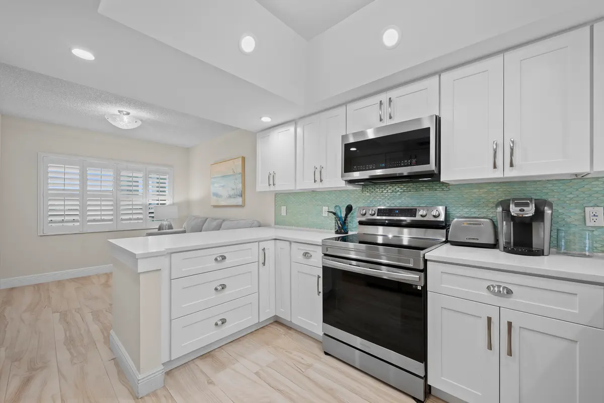 Gourmet Kitchen with Shaker Cabinets at 1045 Ocean Drive 503, Juno Beach