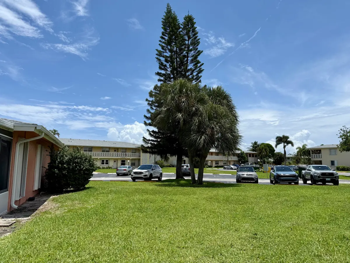 EXTERIOR SIDE at 1460 NW 19th Terrace 71-a, Delray Beach