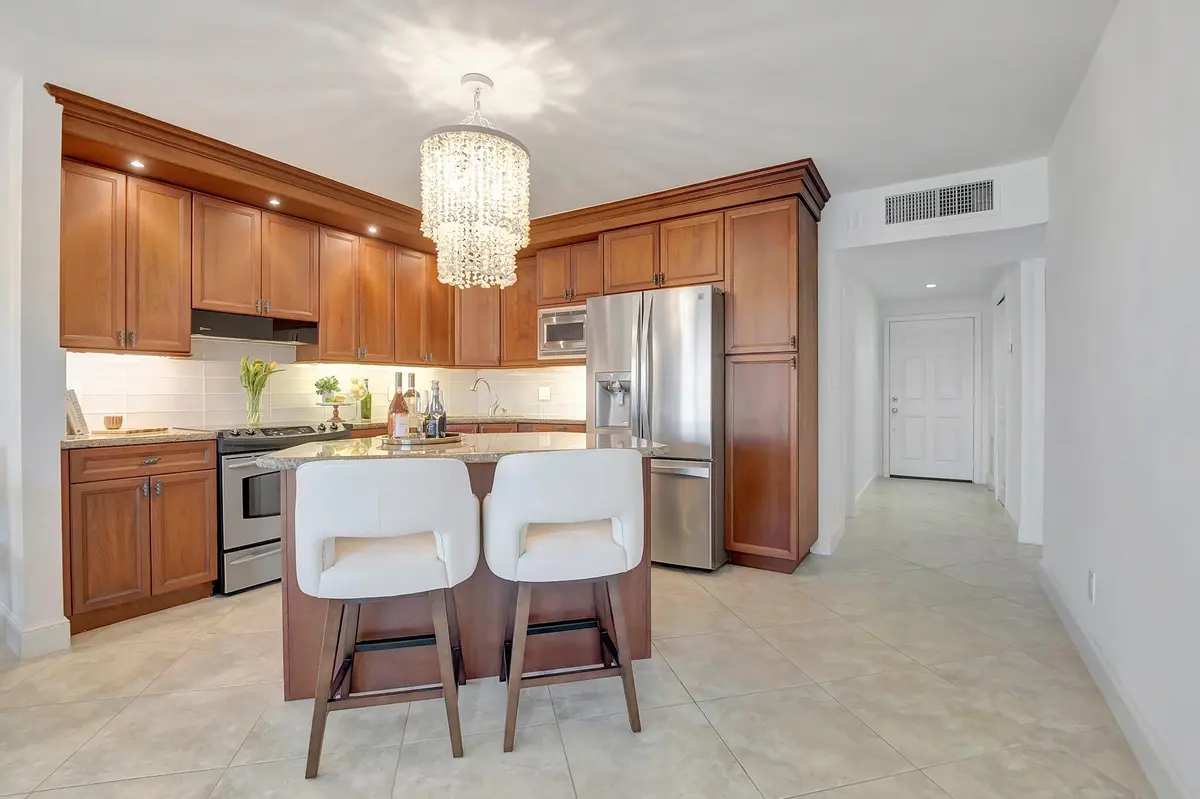 Kitchen w/ Island at 2871 N Ocean Boulevard D506, Boca Raton