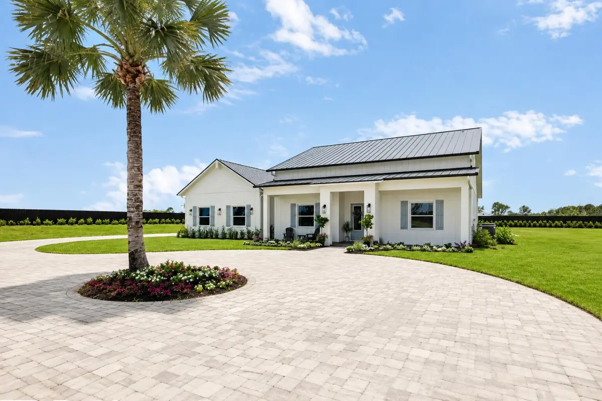 Front palm at 4836 SW Savage Street, Palm City
