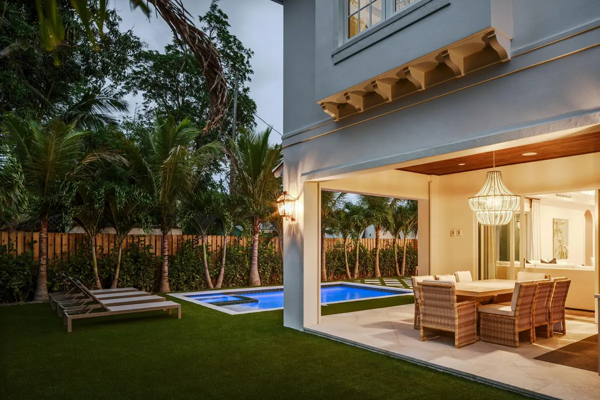 10 - Covered patio with wicker dining se at 309 Greymon Drive, West Palm Beach