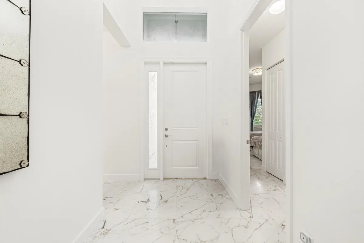 Grand foyer with soaring ceilings. at 12879 Parrot Pond Road, Boynton Beach