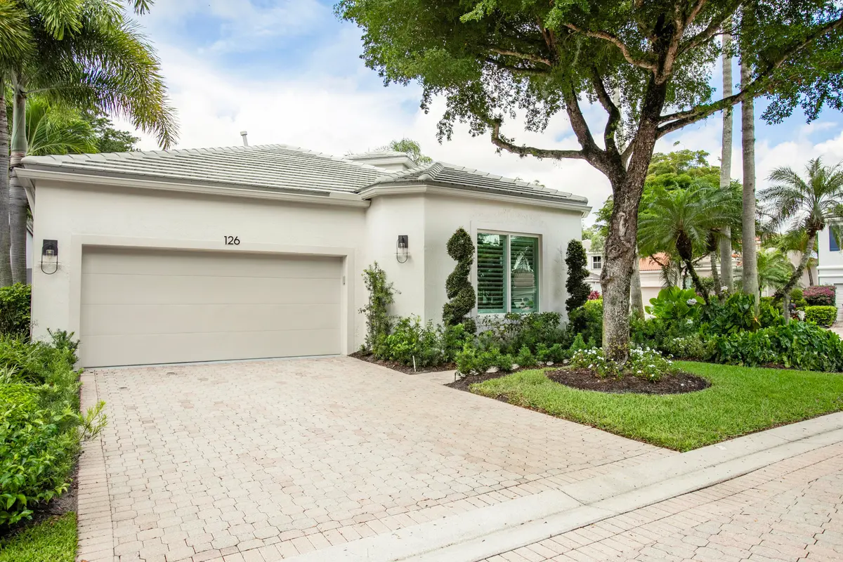 GARAGE ENTRY at 126 Sunset Cove Lane, Palm Beach Gardens