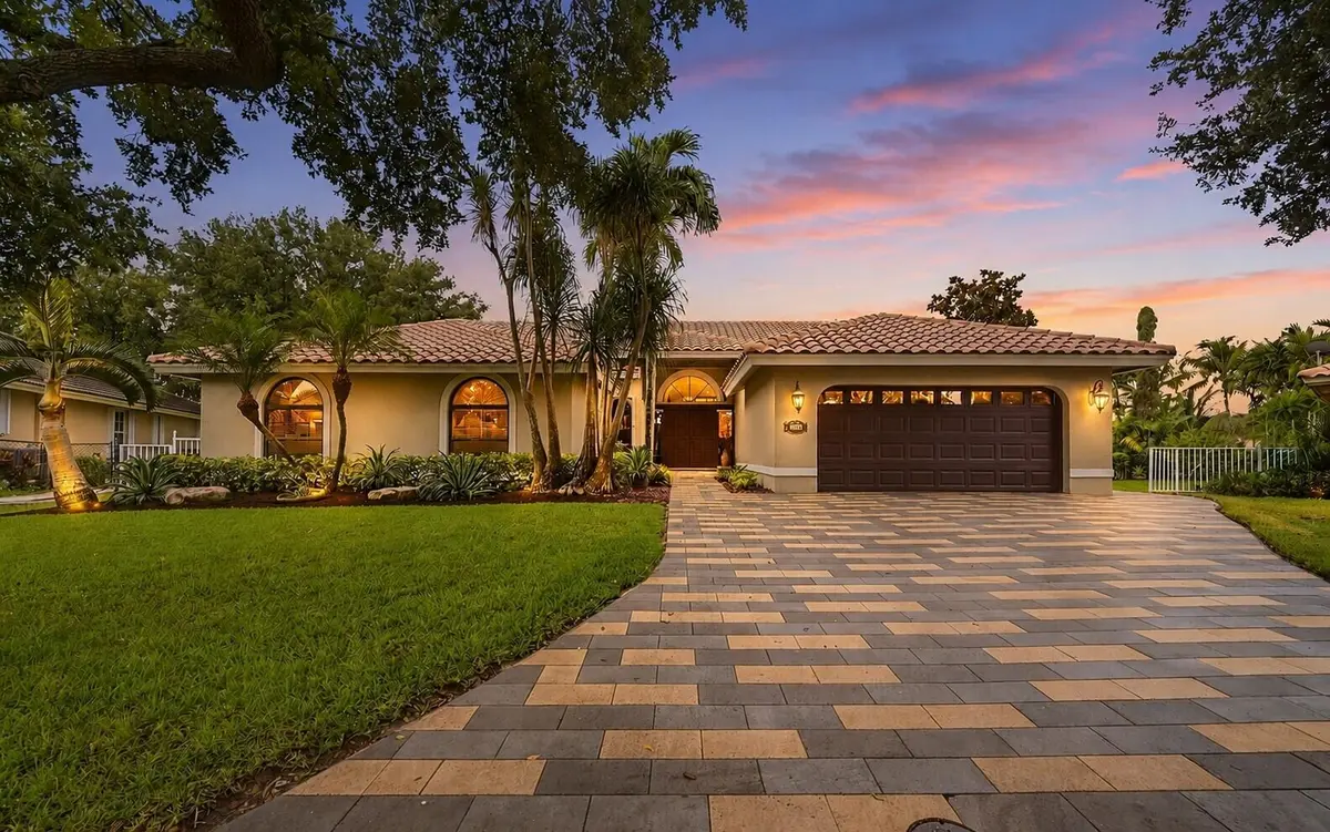 Front of house 1 - twilight at 4704 NW 99th Lane, Coral Springs