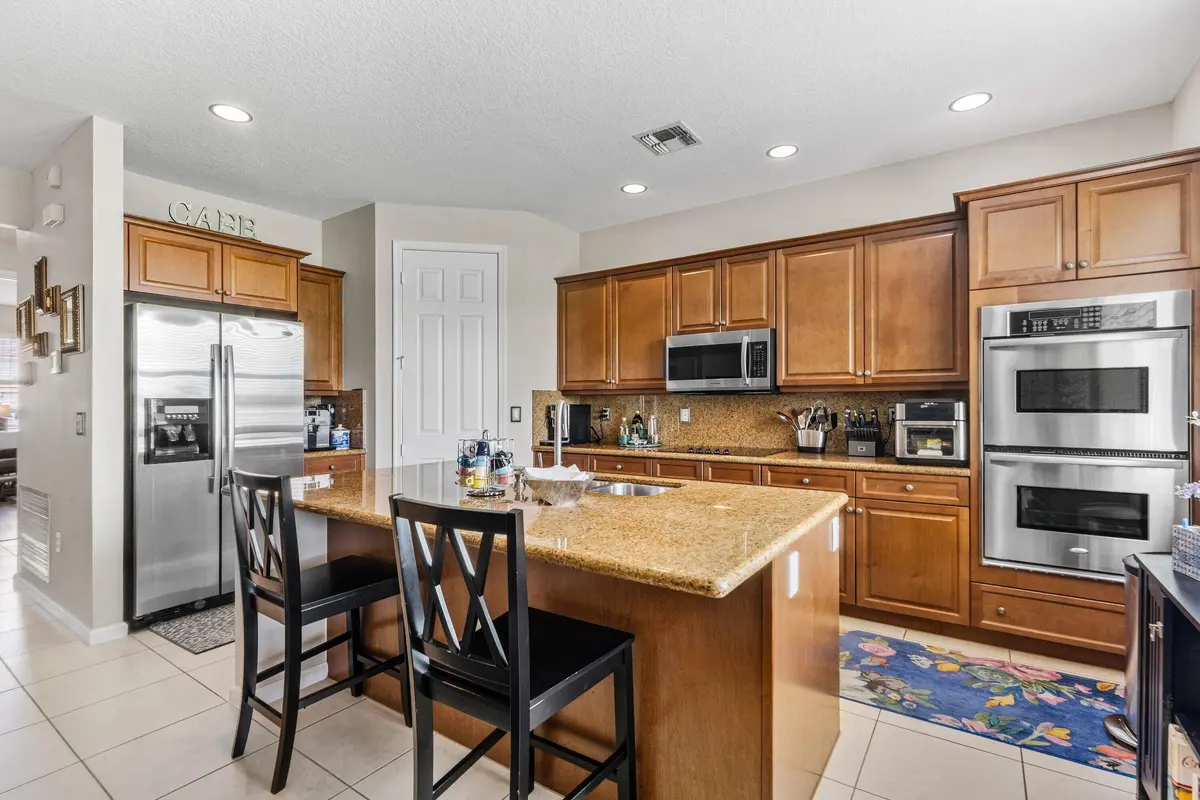 Breakfast Bar at 2404 Bellarosa Circle, Royal Palm Beach