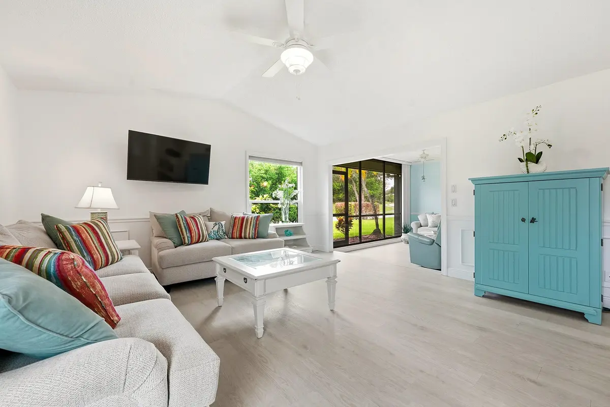 Living room to sunroom at 6786 SE Yorktown Drive, Hobe Sound