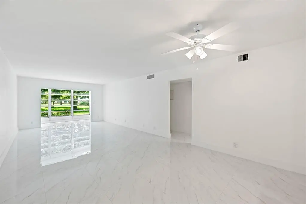 living room at 2202 Lucaya Bend M1, Coconut Creek