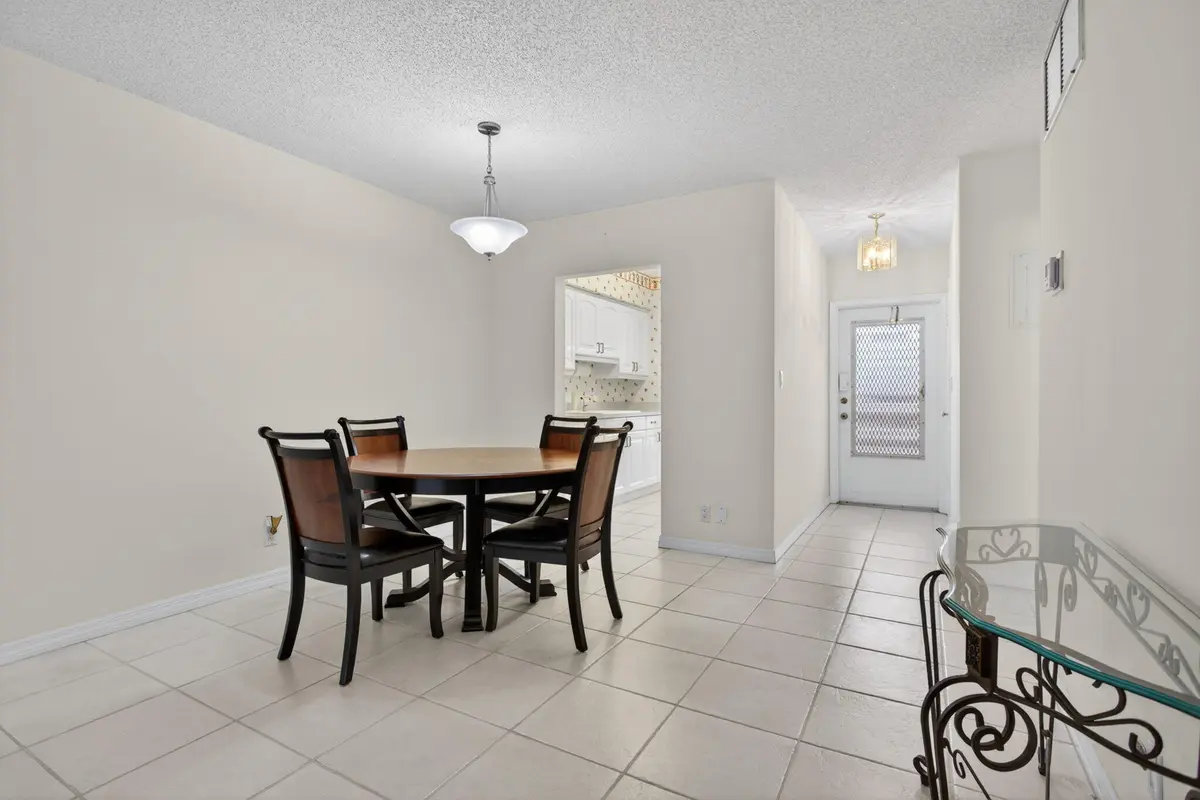 Living to dining room at 2115 NE 42nd Court 109n, Lighthouse Point