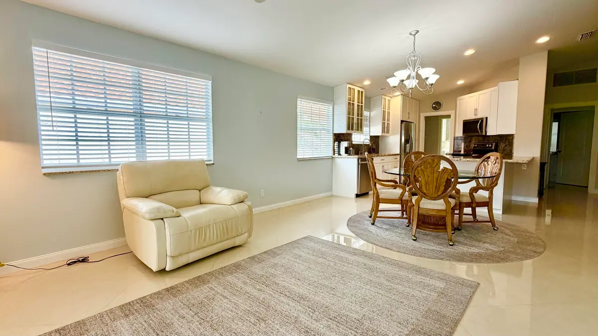 Dining/family at 7735 Pine Island Way, West Palm Beach