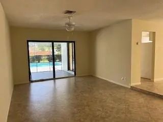 - PATIO DOORS TO POOL COVERED POOL AREA at 10631 NW 39th Street, Coral Springs