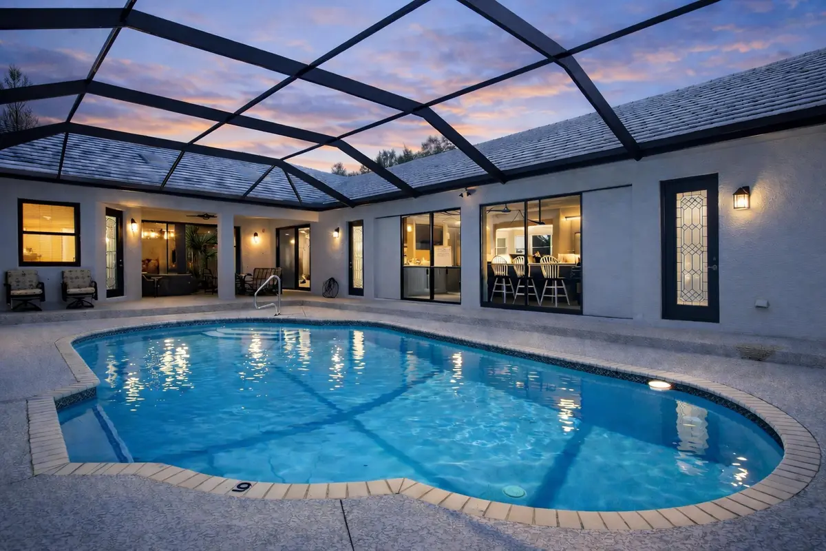 Pool twilight at 3401 SW Holly Lane, Palm City