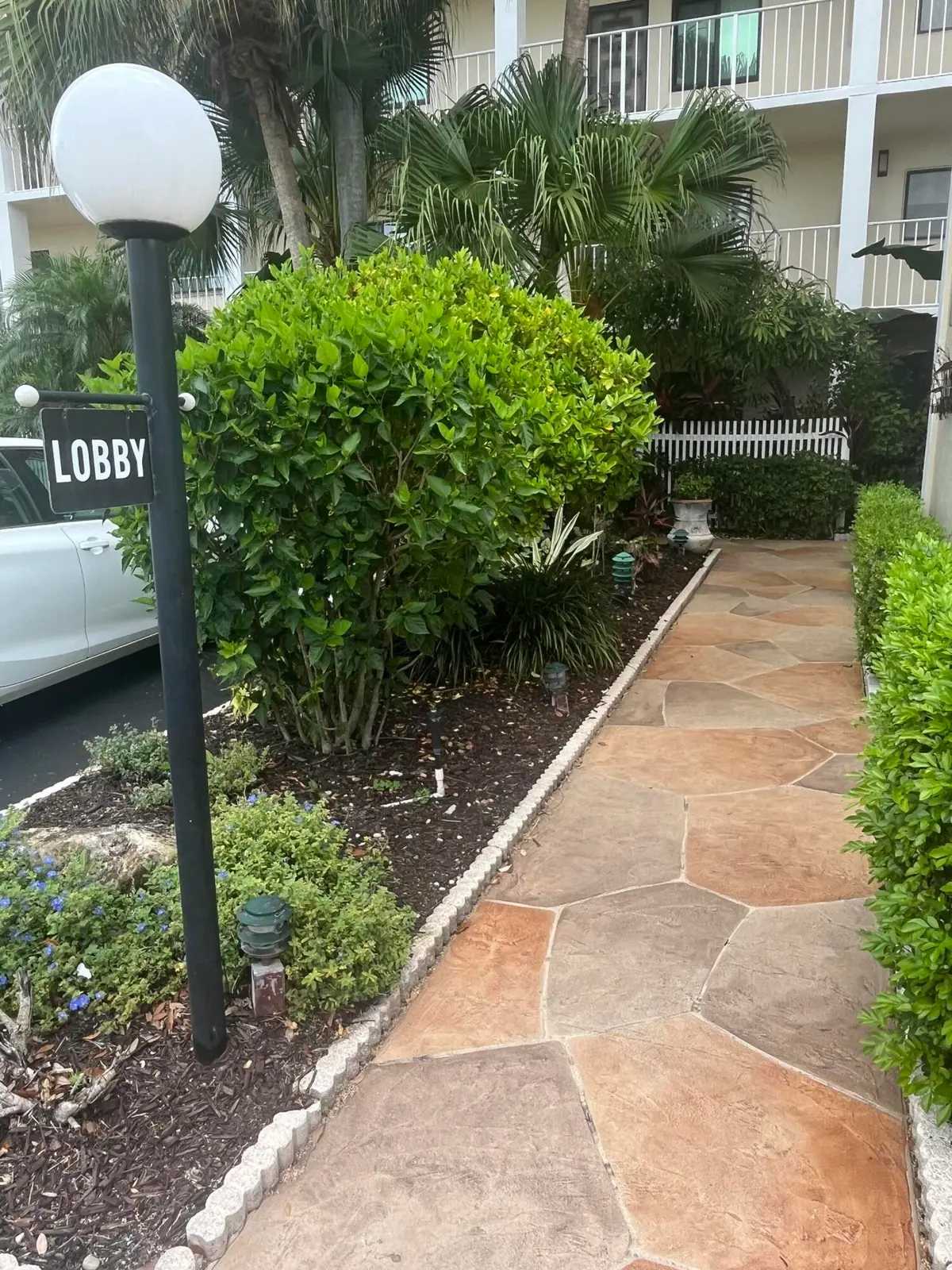 Pathway to Lobby at 7310 Ashford Place 401, Delray Beach