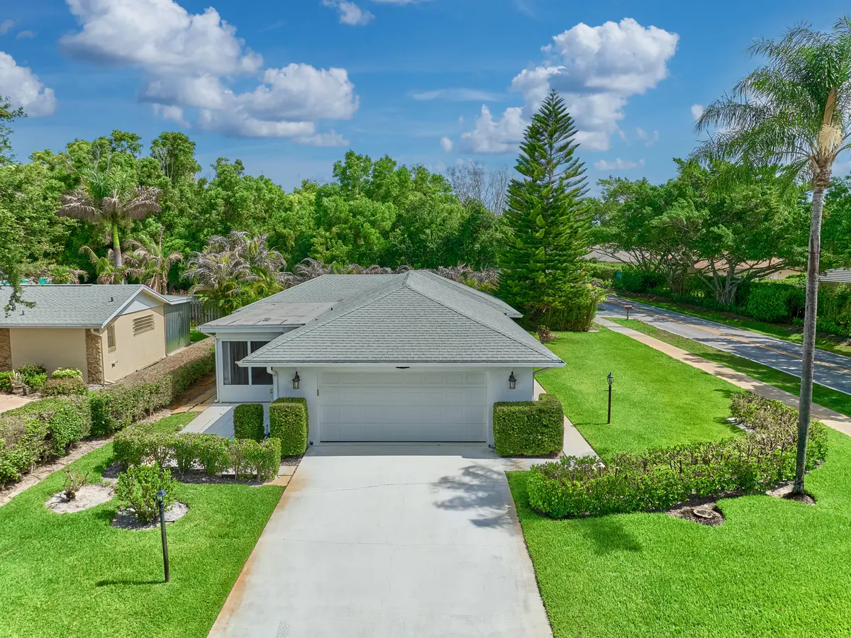 Side Aerial at 9901 SE Little Club Way, Tequesta
