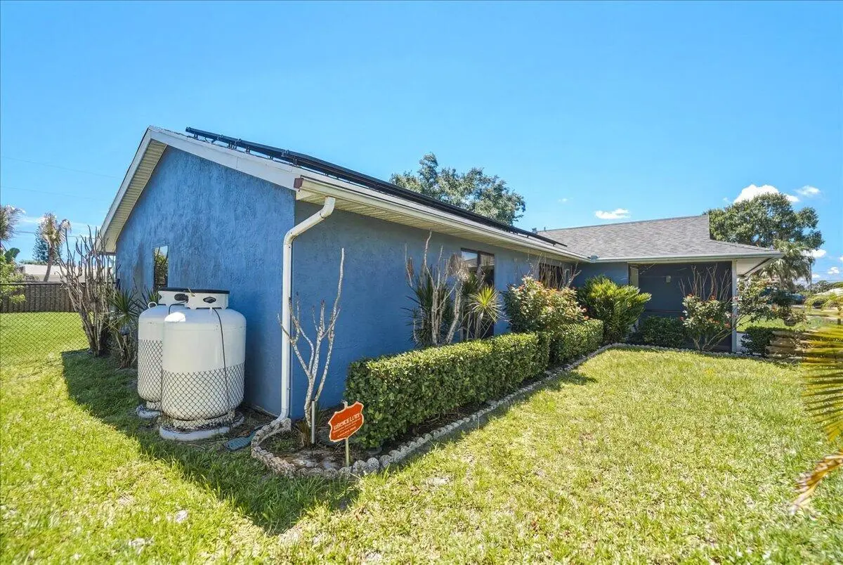 Exterior Front/Side at 465 SE Asbury Lane, Port St. Lucie