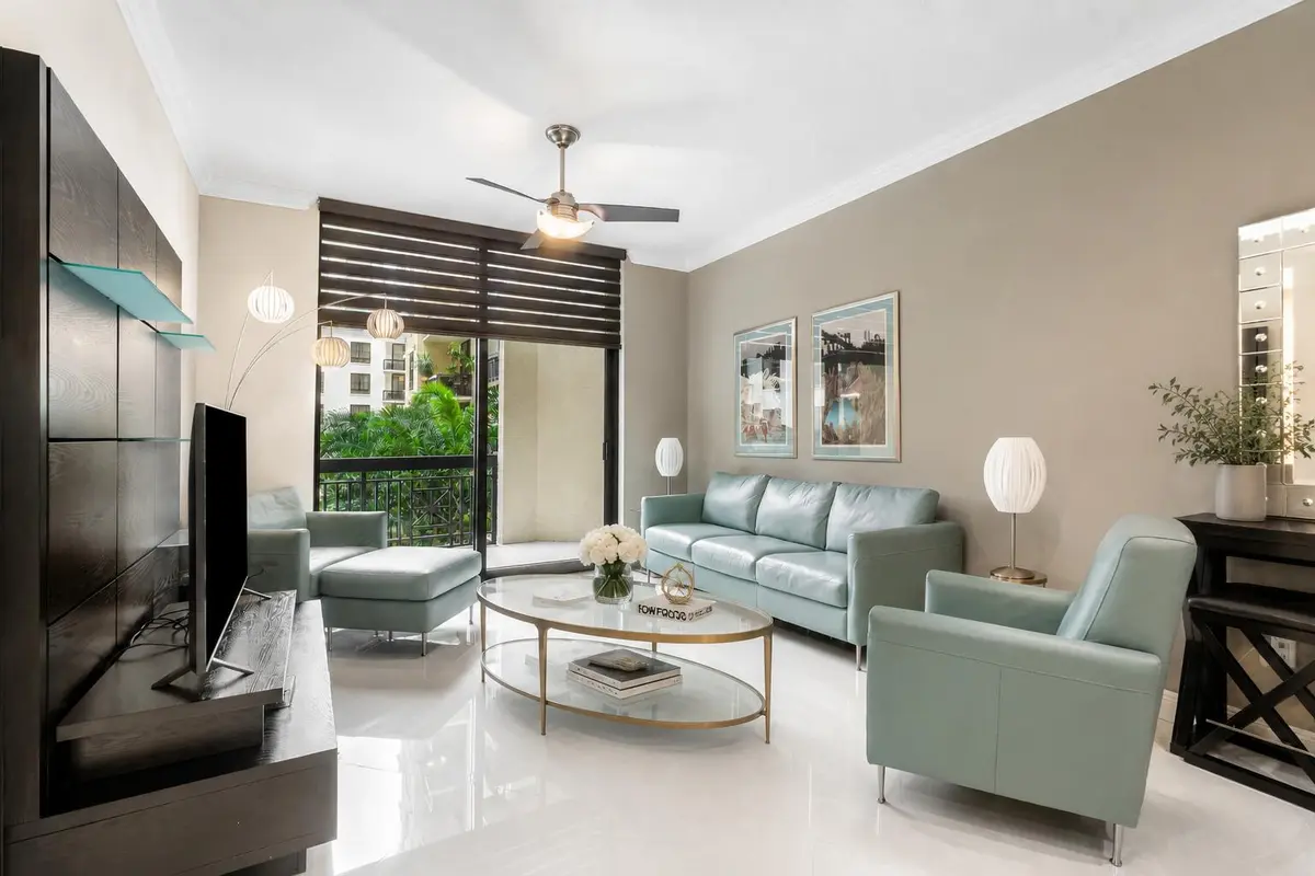 Living Room w/ Virtual Coffee Table at 701 S Olive Avenue 609, West Palm Beach