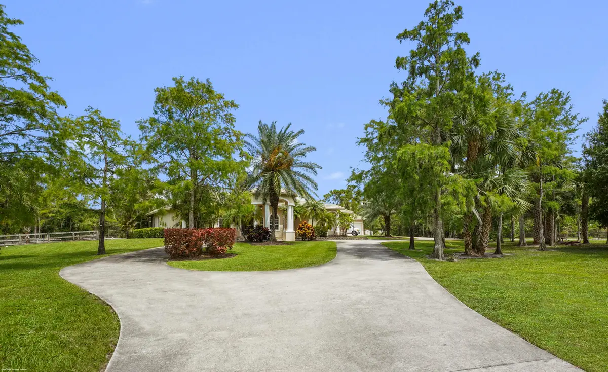 Front Entry Driveway at 2560 Buck Ridge Trail, Loxahatchee