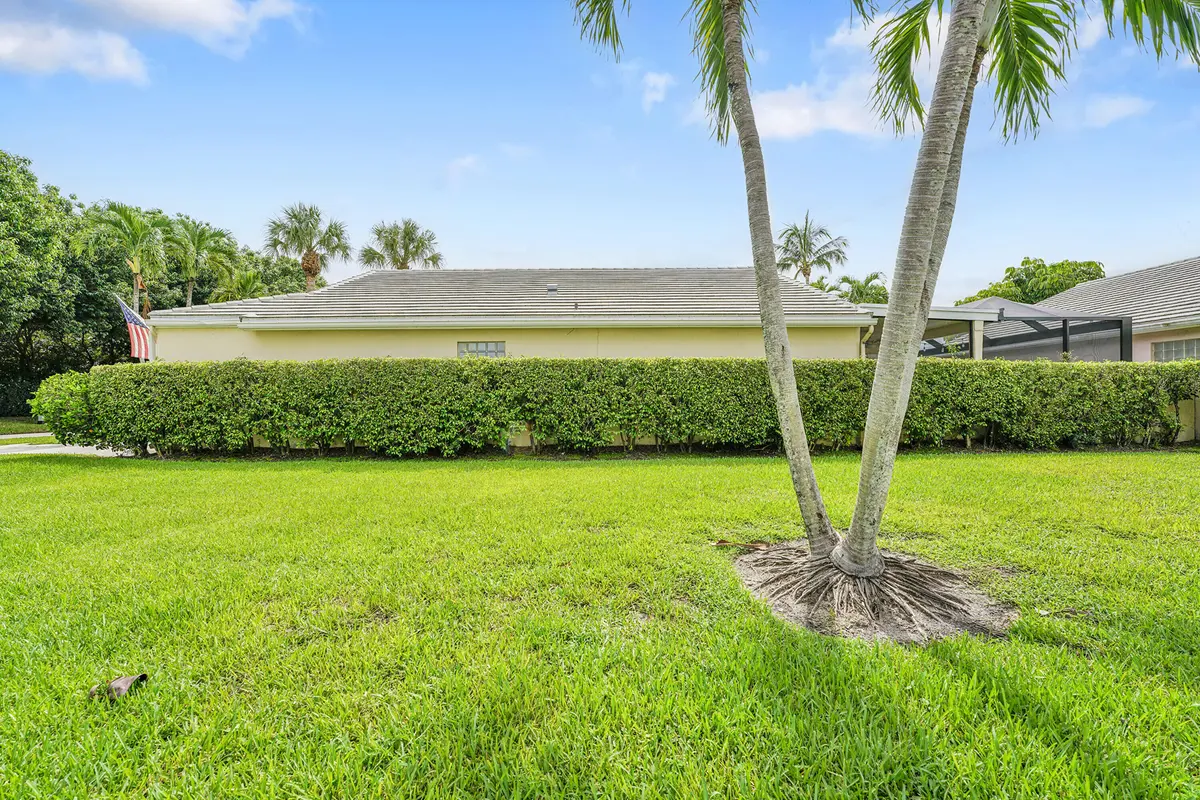 Side of the home at 7917 Travlers Tree Drive, Boca Raton