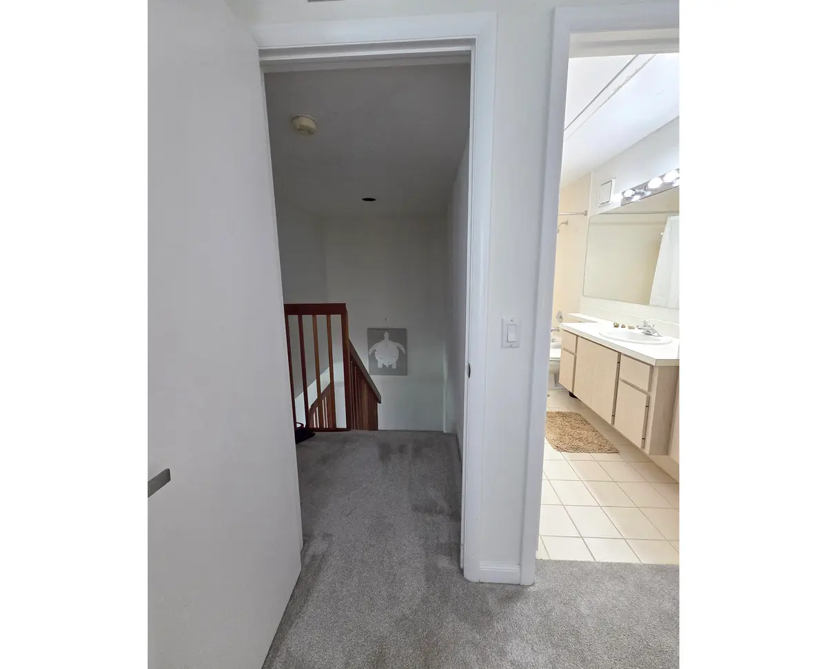 upper stair case at 3391 SW Sunset Trace Circle, Palm City