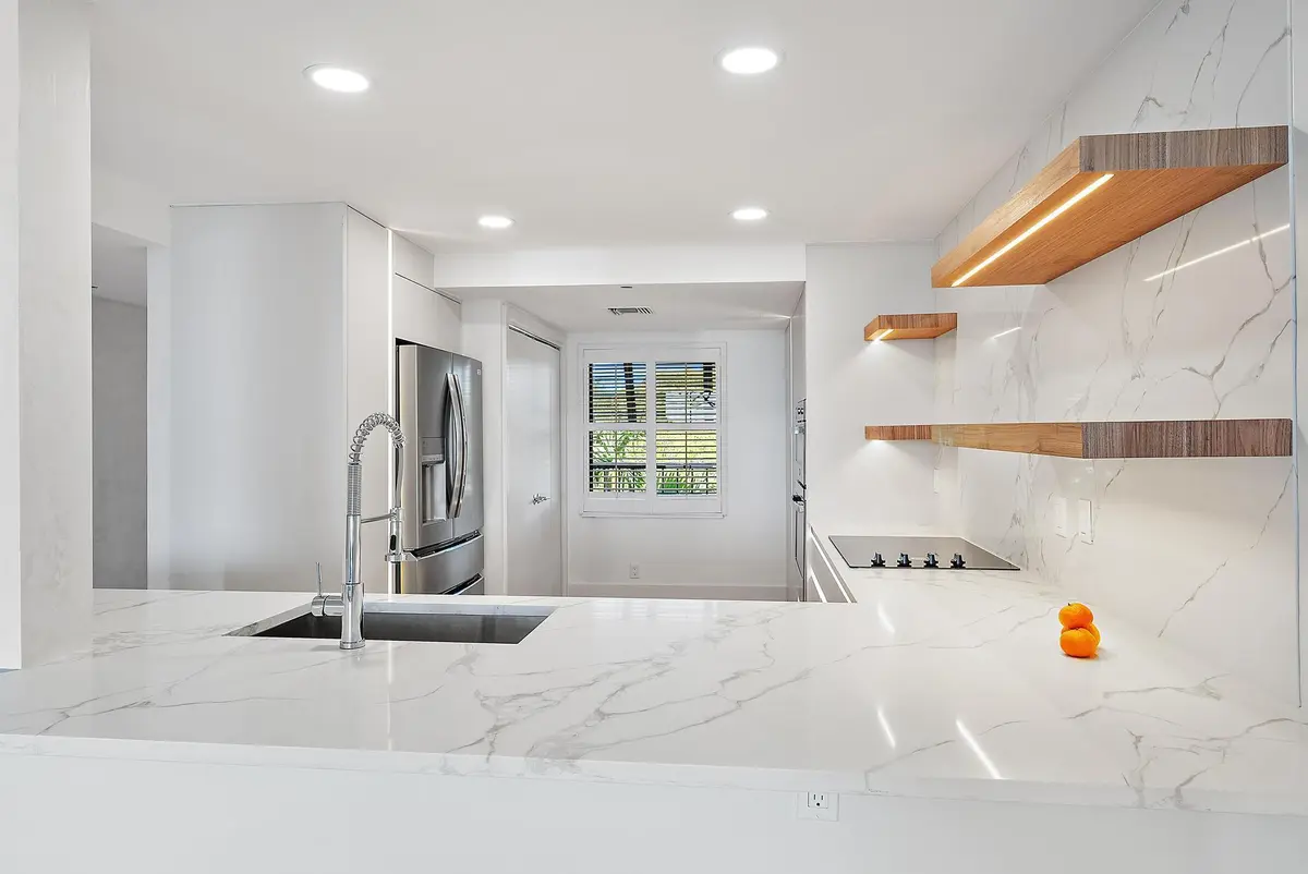 Kitchen View/Open Shutters at 356 GOLFVIEW Road 405, North Palm Beach
