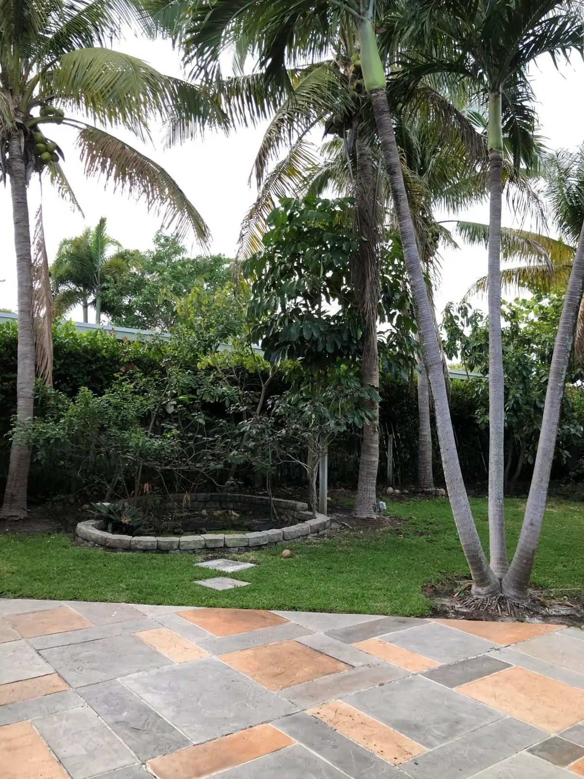 Large patio and fish pond at 12 S Ocean Breeze #2, Lake Worth Beach