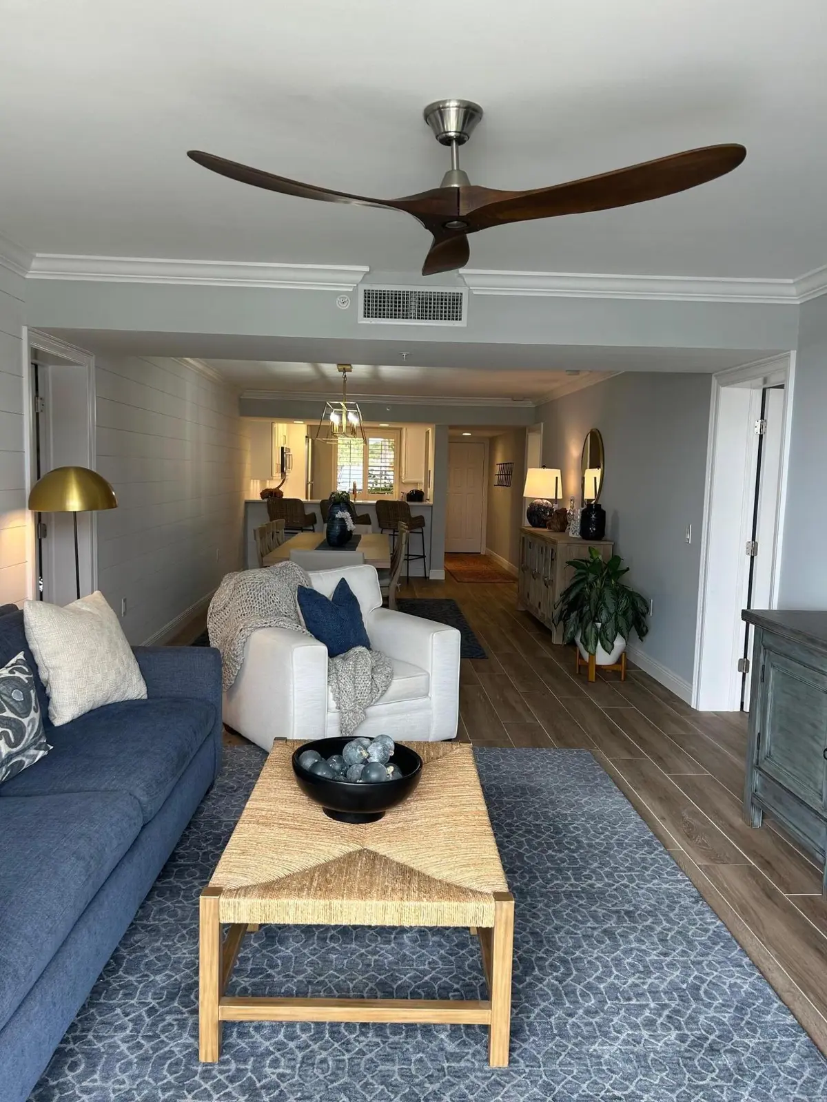 View from patio looking into living room at 2601 Marina Isle Way 105, Jupiter