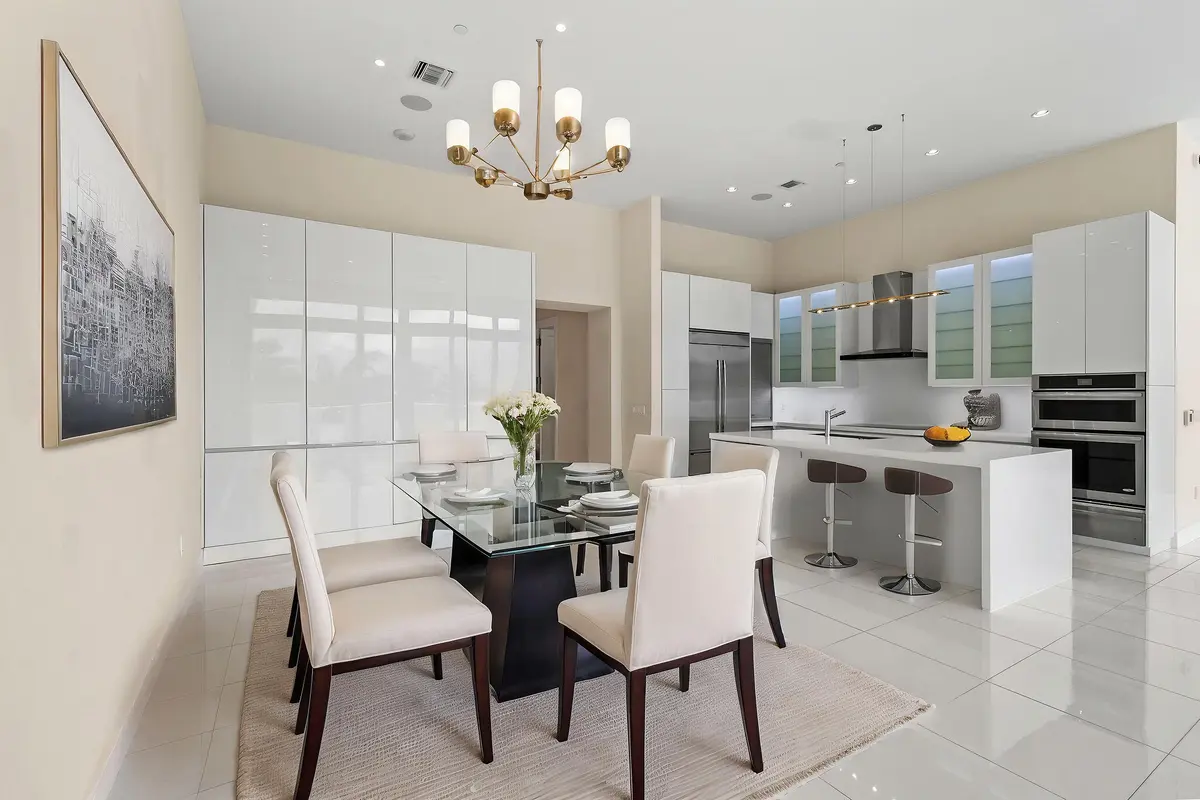 DiningRoom-VirtuallyStaged at 2 Water Club Way 301, North Palm Beach