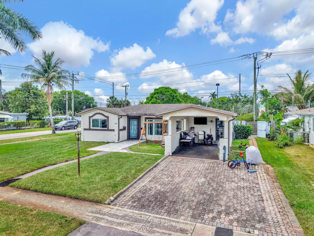 1-web-or-mls-DJI_20260613115358_0003_D at 3300 NW 32nd Street, Lauderdale Lakes