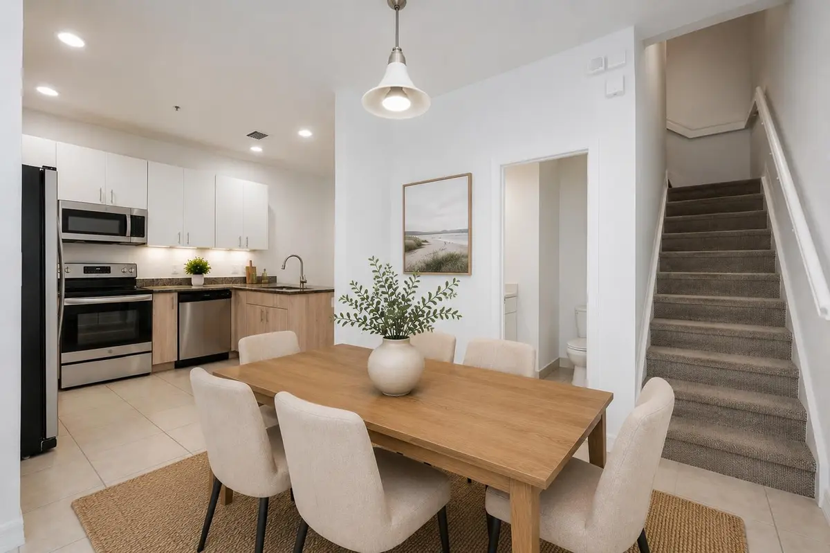 staged dinning room at 107 Ocean Cay Way, Hypoluxo
